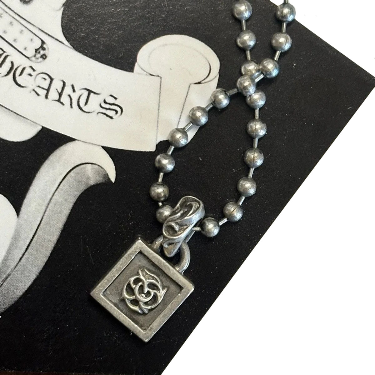CHROME HEARTS FRAMED FLORAL PENDANT